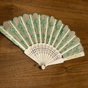 Vintage Embroidered Fan 
Green and off white cloth with gold accents